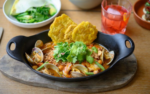 Clams and shrimp with a side of fried plantains at Edge Brasserie and Cocktail Bar