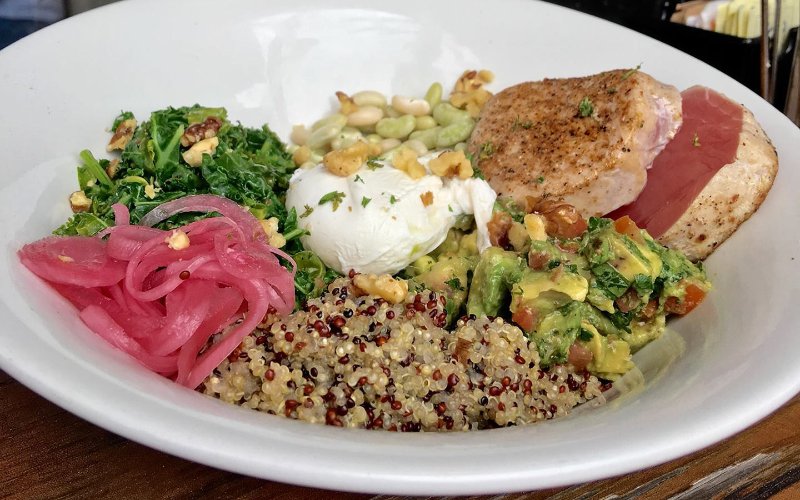 Salad with a side of pickled red onions at Josh's Deli