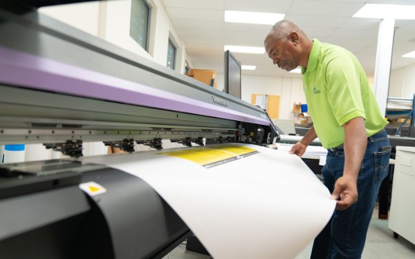 Glen inside his store Go Green Document Solutions Inc.